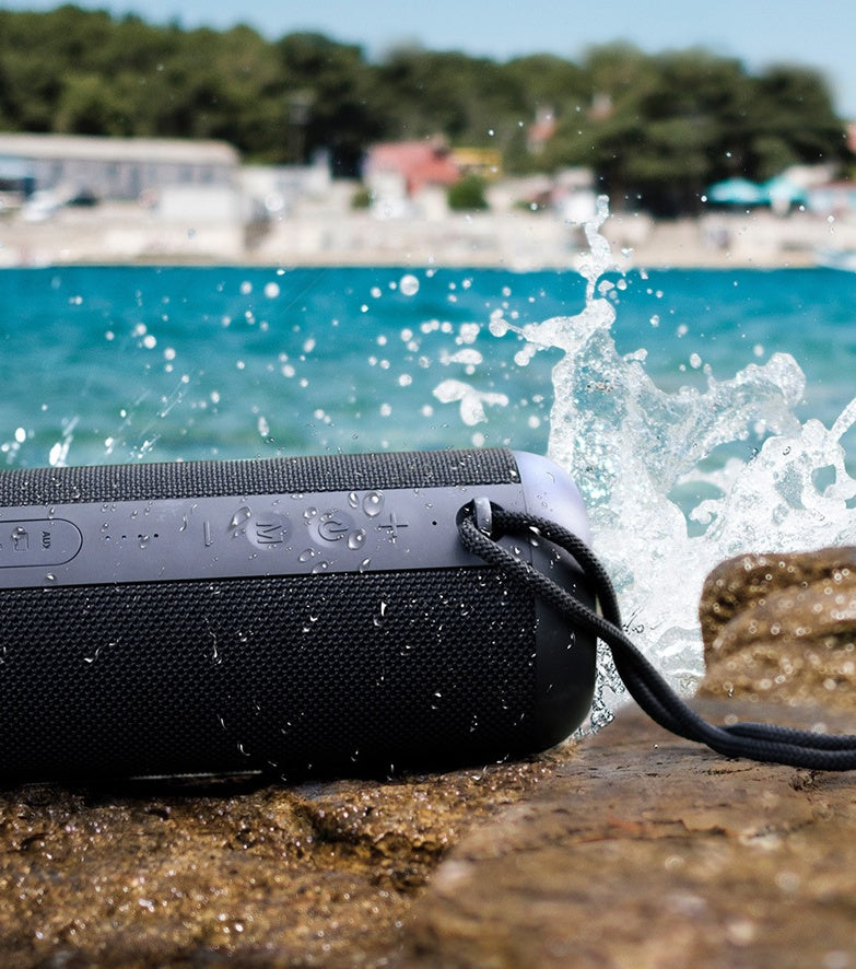 Waterproof Bluetooth Speaker with portable wireless audio, rechargeable battery, and water-resistant design