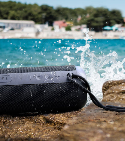 Waterproof Bluetooth Speaker with portable wireless audio, rechargeable battery, and water-resistant design
