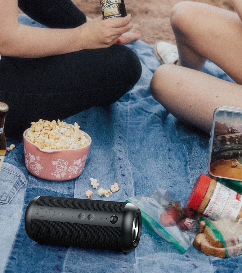 Waterproof Bluetooth Speaker with portable wireless audio, rechargeable battery, and water-resistant design